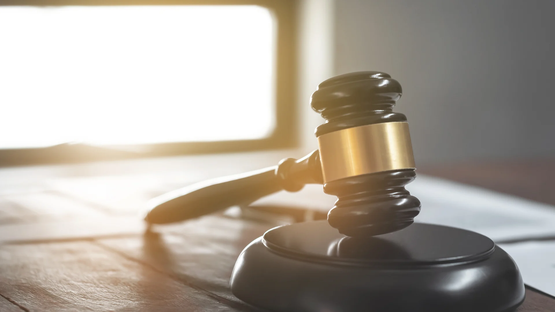 a gavel on a wooden surface in Panama City, FL